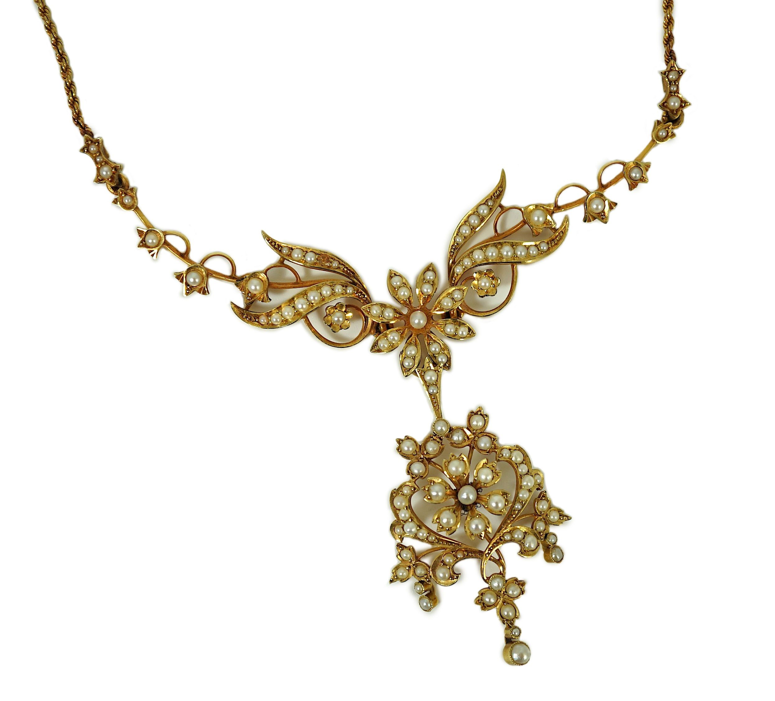 A late Victorian 15ct gold and seed pearl set drop pendant necklace